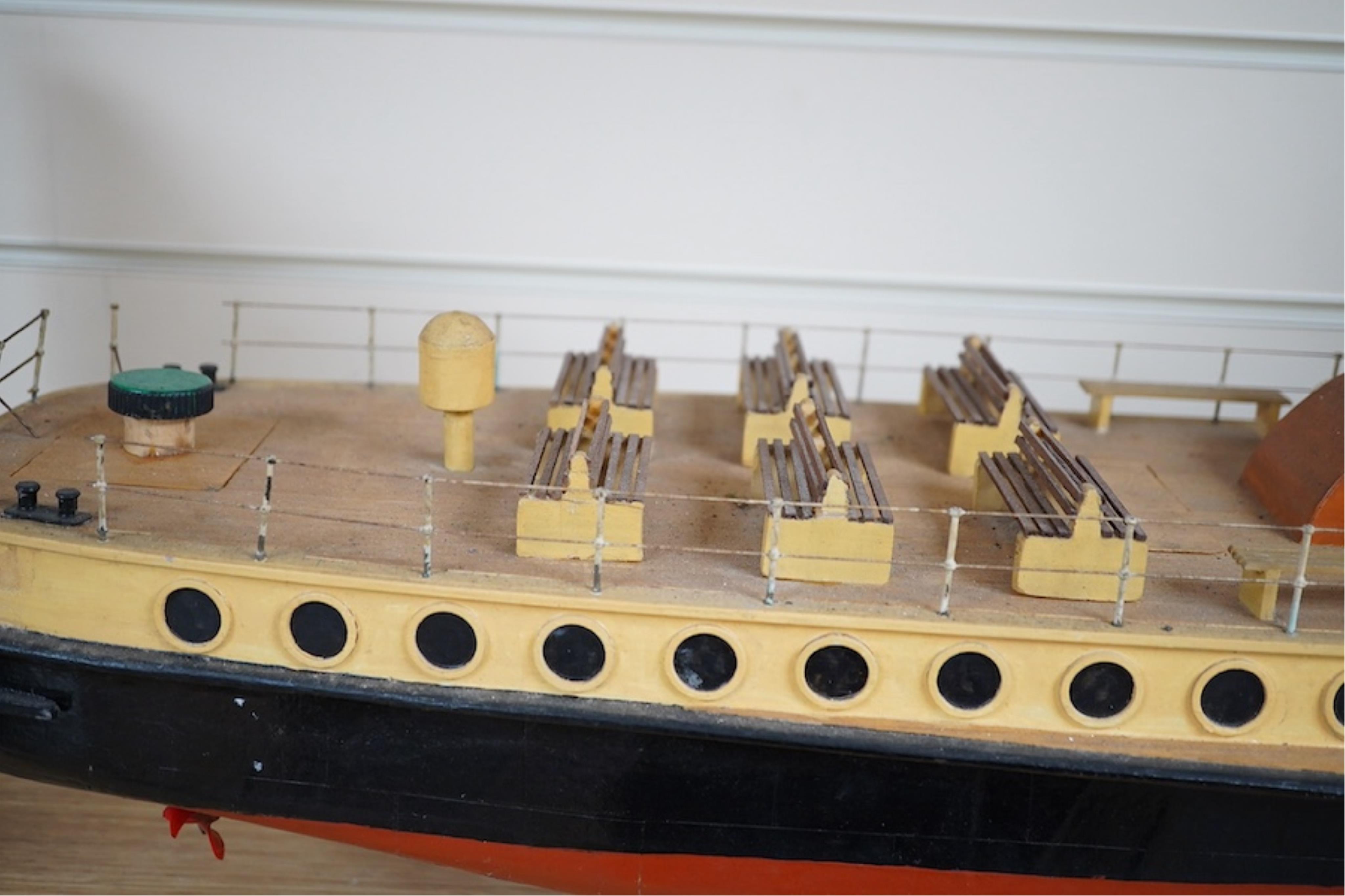 A scratch built model of an Isle of Man steam passenger ferry, 'Mona', of wood, card and plastic construction, powered by two electric motors, hull 108cm long. Condition - fair